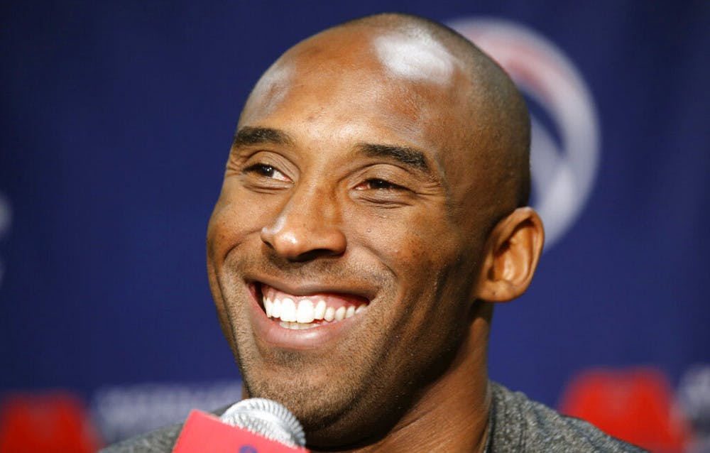 <p>FILE - In this Nov. 26, 2013 file photo Los Angeles Lakers guard Kobe Bryant smiles during a media availability before an NBA basketball game against the Washington Wizards in Washington. The Retired NBA superstar has died in helicopter crash in Southern California, Sunday, Jan. 26, 2020. (AP Photo/Alex Brandon)</p>