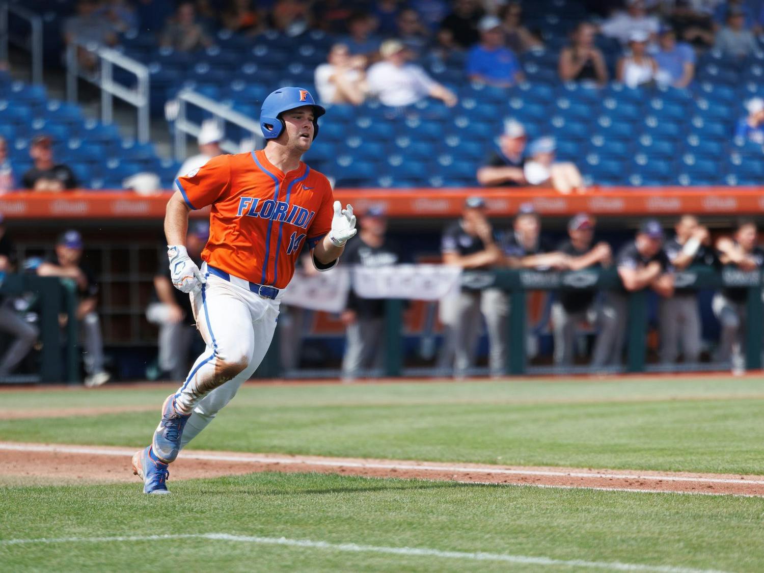 Florida catcher Karson Bowen (14) runs to first base during an NCAA baseball game against High Point University, Friday, March 8, 2026, in Gainesville, Fla.