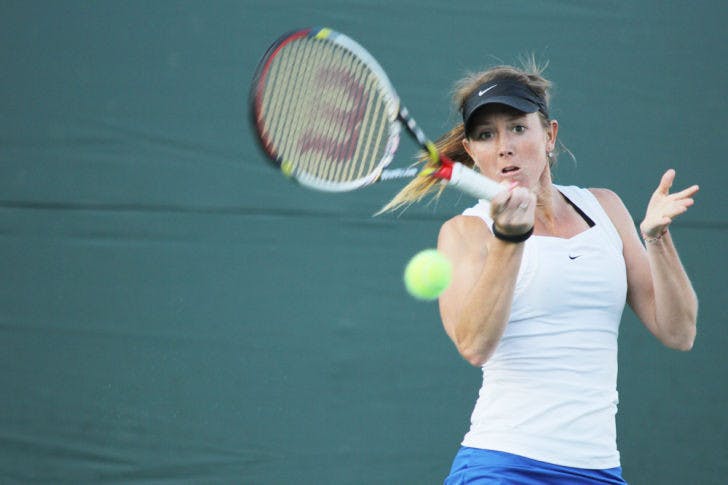 Senior Lauren Embree returns a ball during Florida’s 4-1 win against Georgia on March 15. Embree lost to Stanford's Nicole Gibbs&nbsp;6-0, 6-1 as the Cardinal defeated the Gators 4-3 to advance to the NCAA title match.