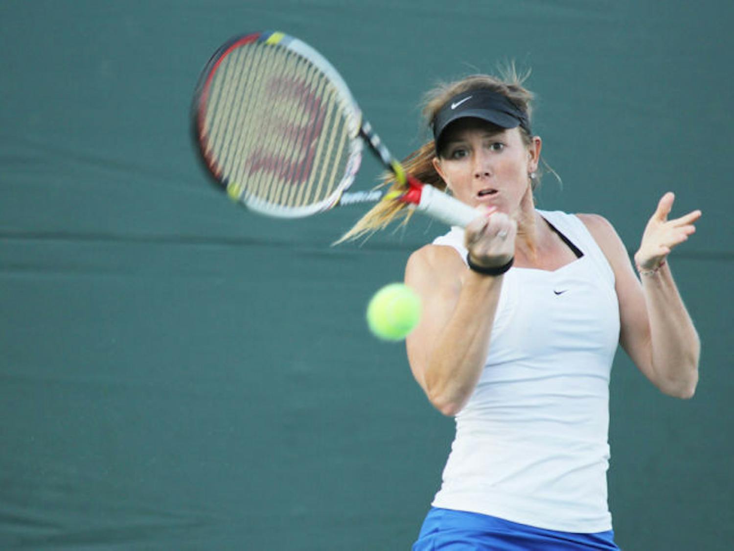 Senior Lauren Embree returns a ball during Florida’s 4-1 win against Georgia on March 15. Embree lost to Stanford's Nicole Gibbs 6-0, 6-1 as the Cardinal defeated the Gators 4-3 to advance to the NCAA title match.