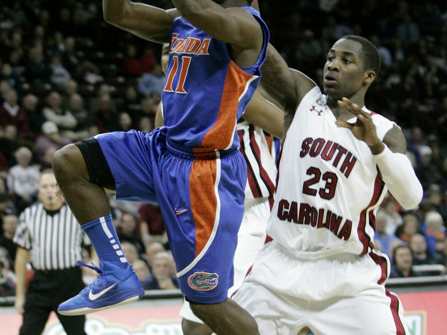 Florida guard Erving Walker drives to the hoop during the first half of the Gators’ 79-60 win on Wednesday. Walker led UF with 25 points on 7-of-9 shooting.