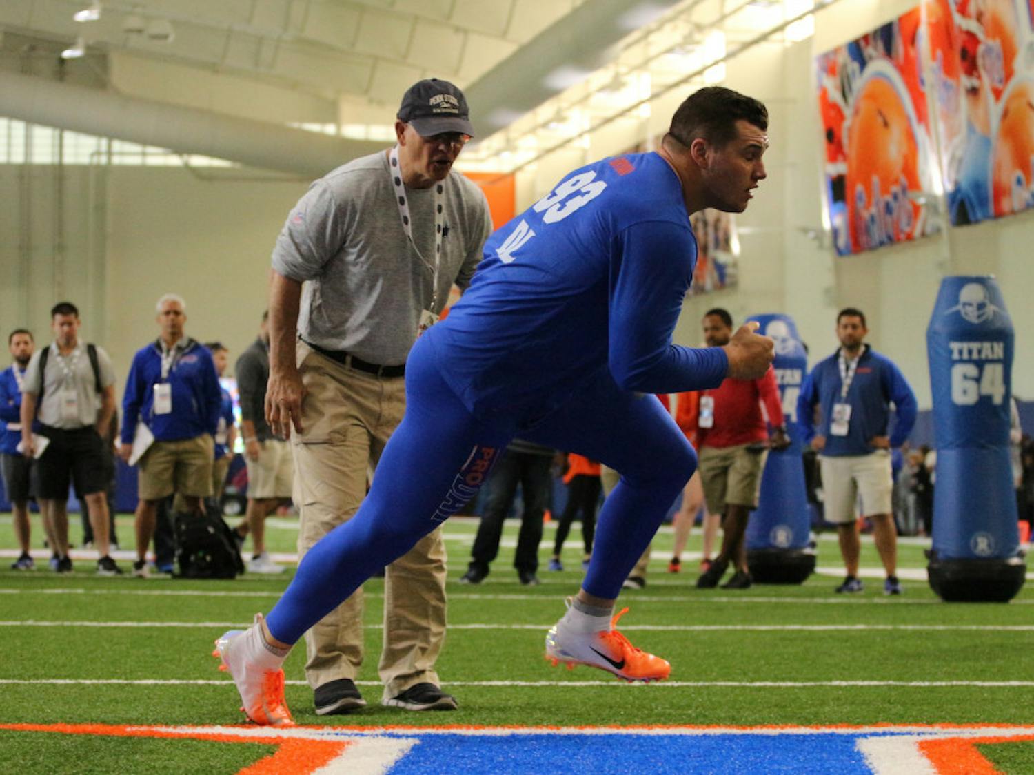 Florida defensive lineman Taven Bryan gets instruction from Dallas Cowboys defensive coordinator Rob Marinelli during UF's pro day on Wednesday.