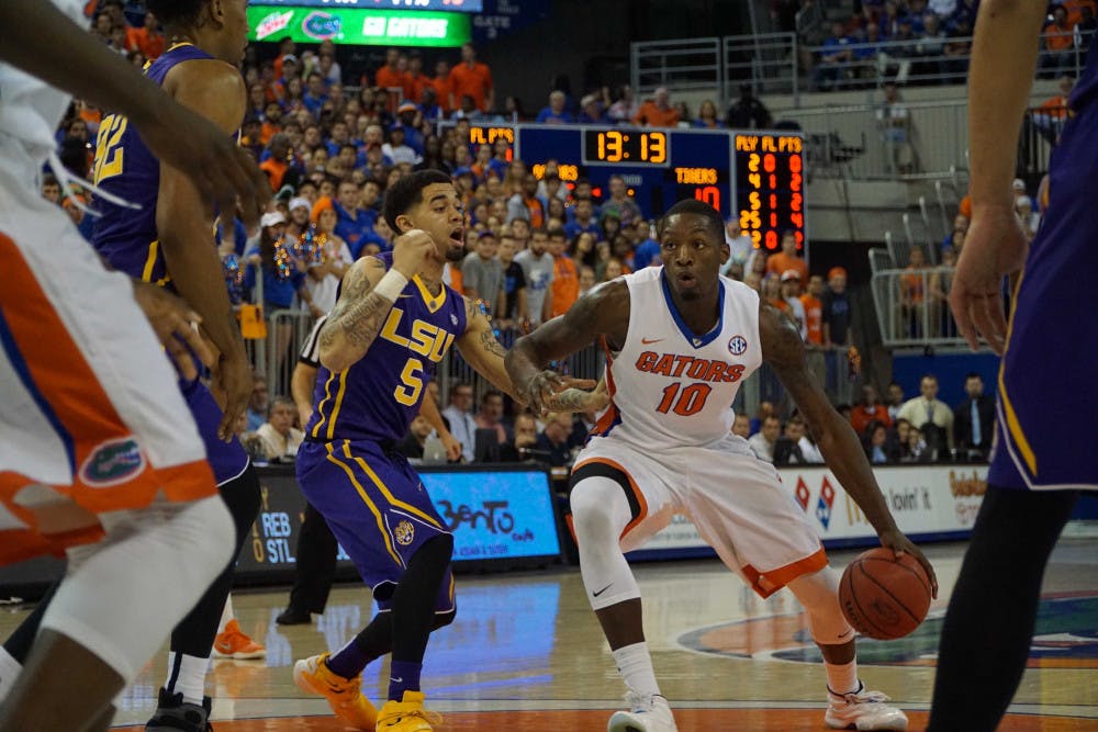 UF’s Dorian Finney-Smith drives into the paint during Florida’s 68-62 win over LSU on Jan. 9, 2016, in the O’Connell Center.