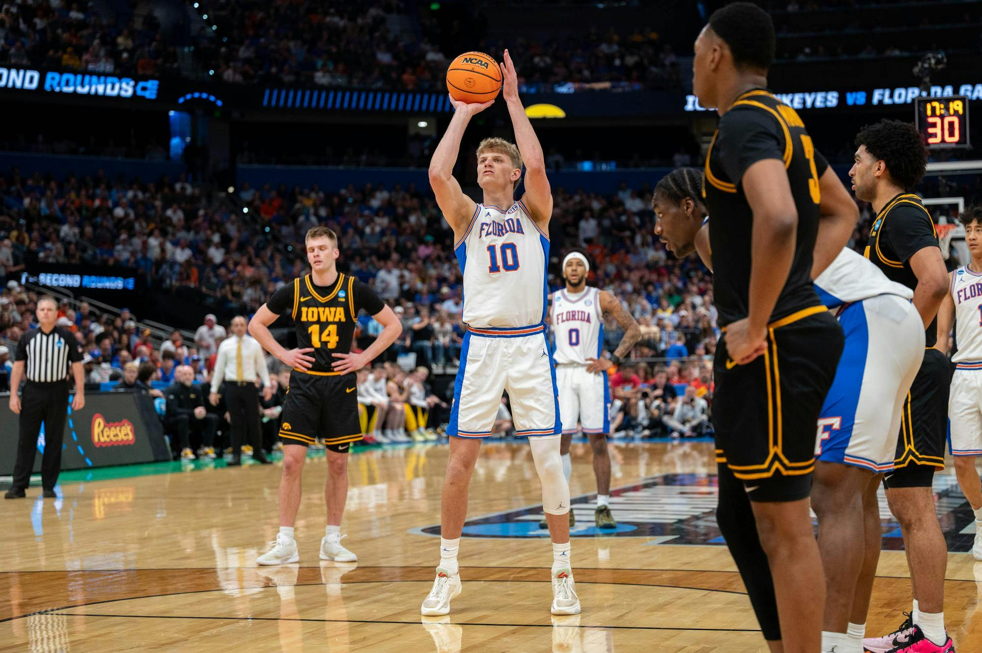 Florida forward Thomas Haugh (10) shoots a free throw during the second half of an NCAA Tournament second round game against Iowa, Sunday, March 22, 2026, in Tampa, Fla.