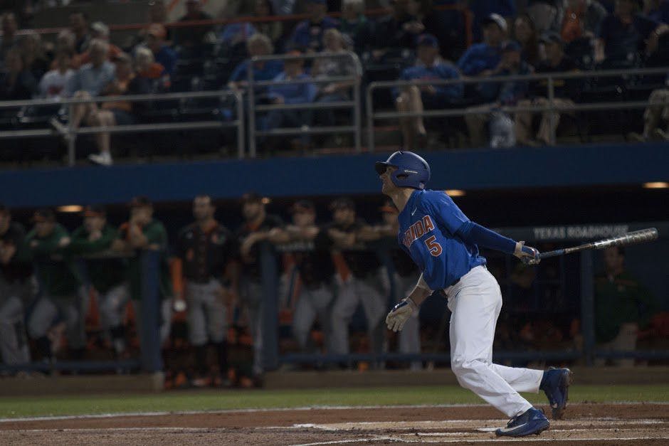 UF shortstop Dalton Guthrie swings during Florida's 2-0 win against Miami on Feb. 25, 2017, at McKethan Stadium.