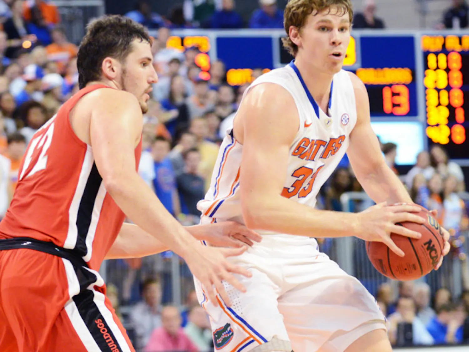 Forward Erik Murphy passes the ball during Florida’s 77-44 win against Georgia on Jan. 9 in the O’Connell Center. Murphy scored 17 points in Florida's 61-57 loss at Kentucky on Saturday.