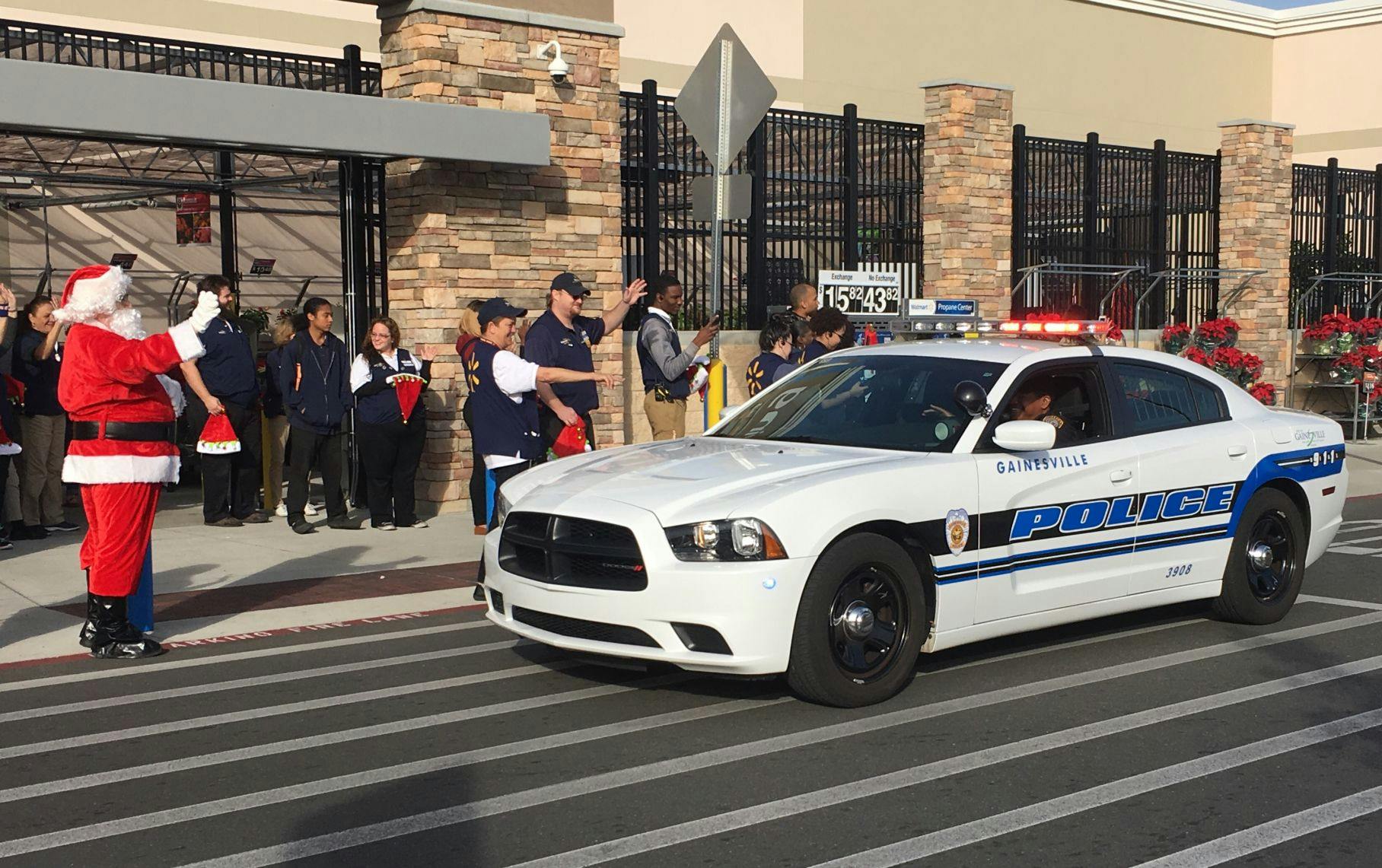 More than 20 Alachua County students arrived at Walmart in police cars. Santa along with an eager group of Walmart employees greeted them before they began shopping.&nbsp;