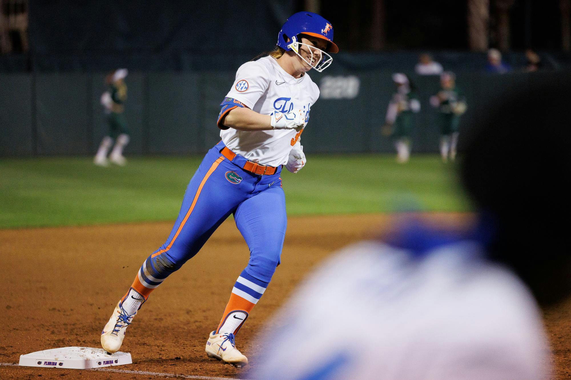 Florida Gators infielder Kenleigh Cahalan rounds the bases after hitting a grand slam during the third inning of an NCAA softball game against Jacksonville, Wednesday, Feb. 11, 2026, in Gainesville, Fla.