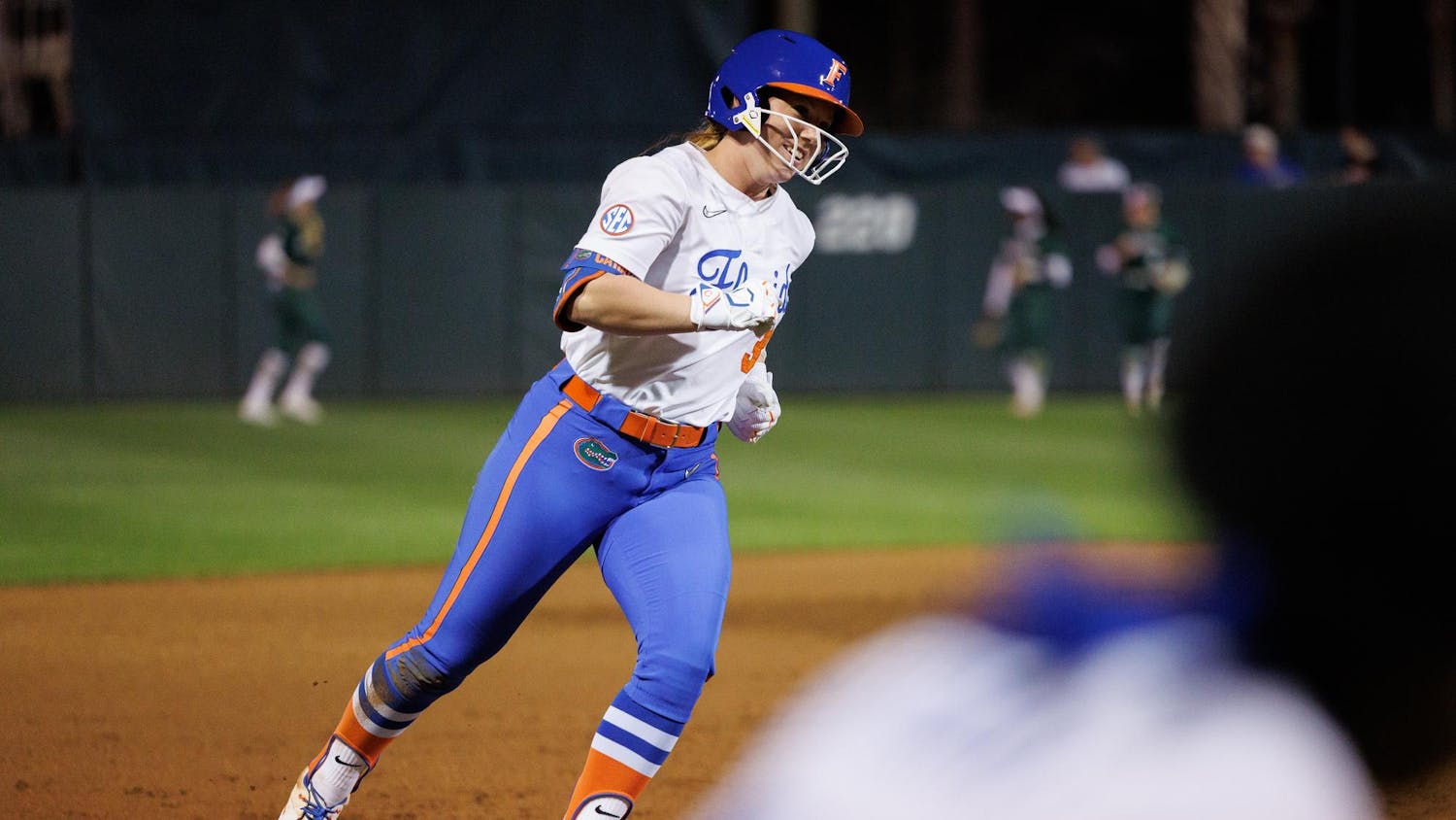 Florida Gators infielder Kenleigh Cahalan rounds the bases after hitting a grand slam during the third inning of an NCAA softball game against Jacksonville, Wednesday, Feb. 11, 2026, in Gainesville, Fla.