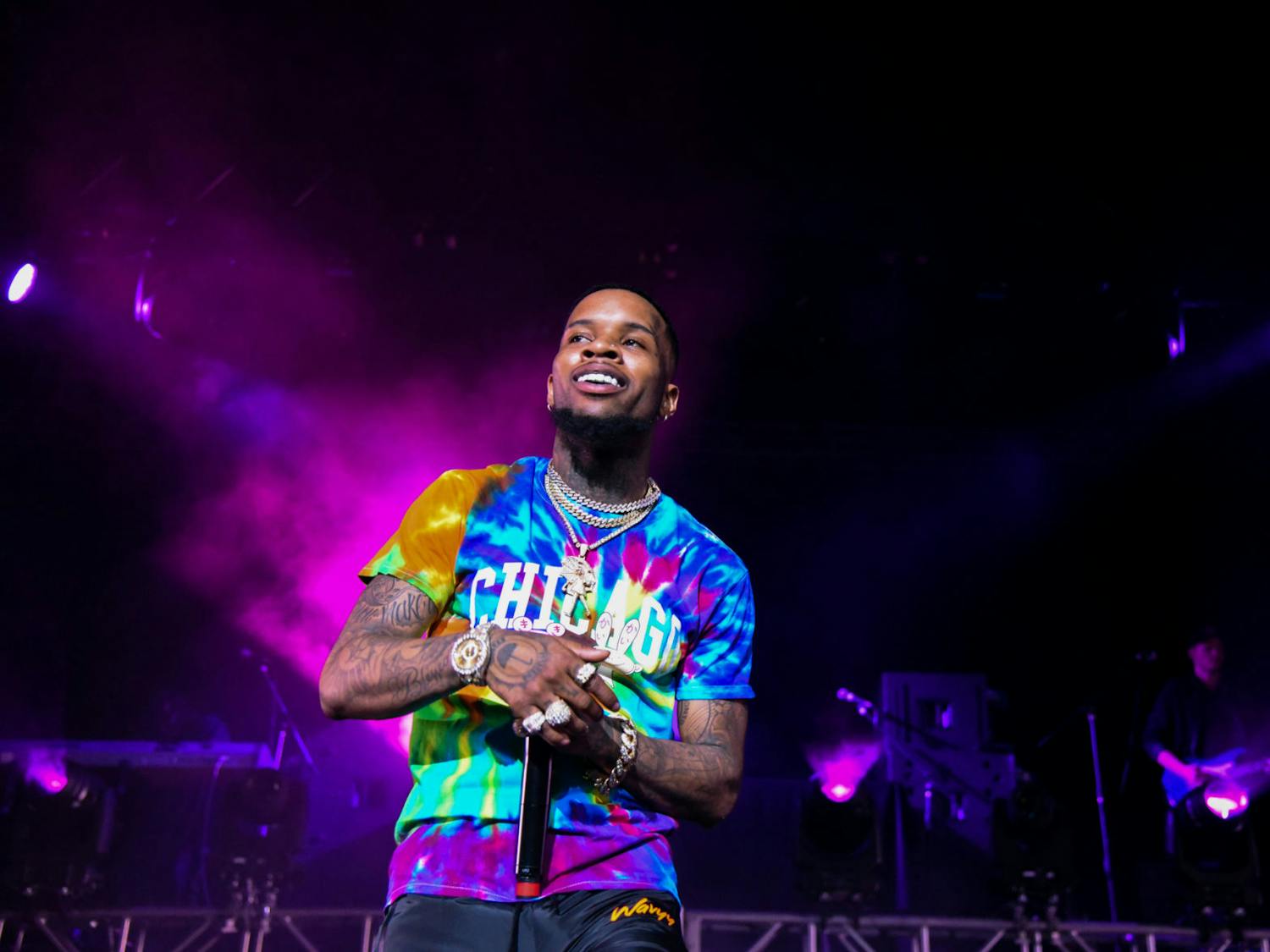 Tory Lanez sings his first song at the O’Connell Center Monday night, but stops in between songs to smile at the audience.