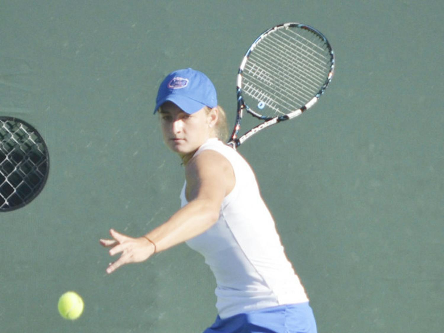 Kourtney Keegan swings at the ball on Oct. 11,2013 at the Bedford Cup at the Ring Tennis Complex.