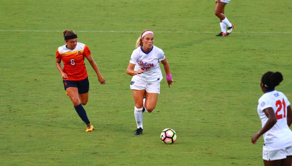 UF midfielder Parker Roberts runs with the ball during Florida's 2-1 win against Syracuse on Aug. 27, 2017, at Donald R. Dizney Stadium.