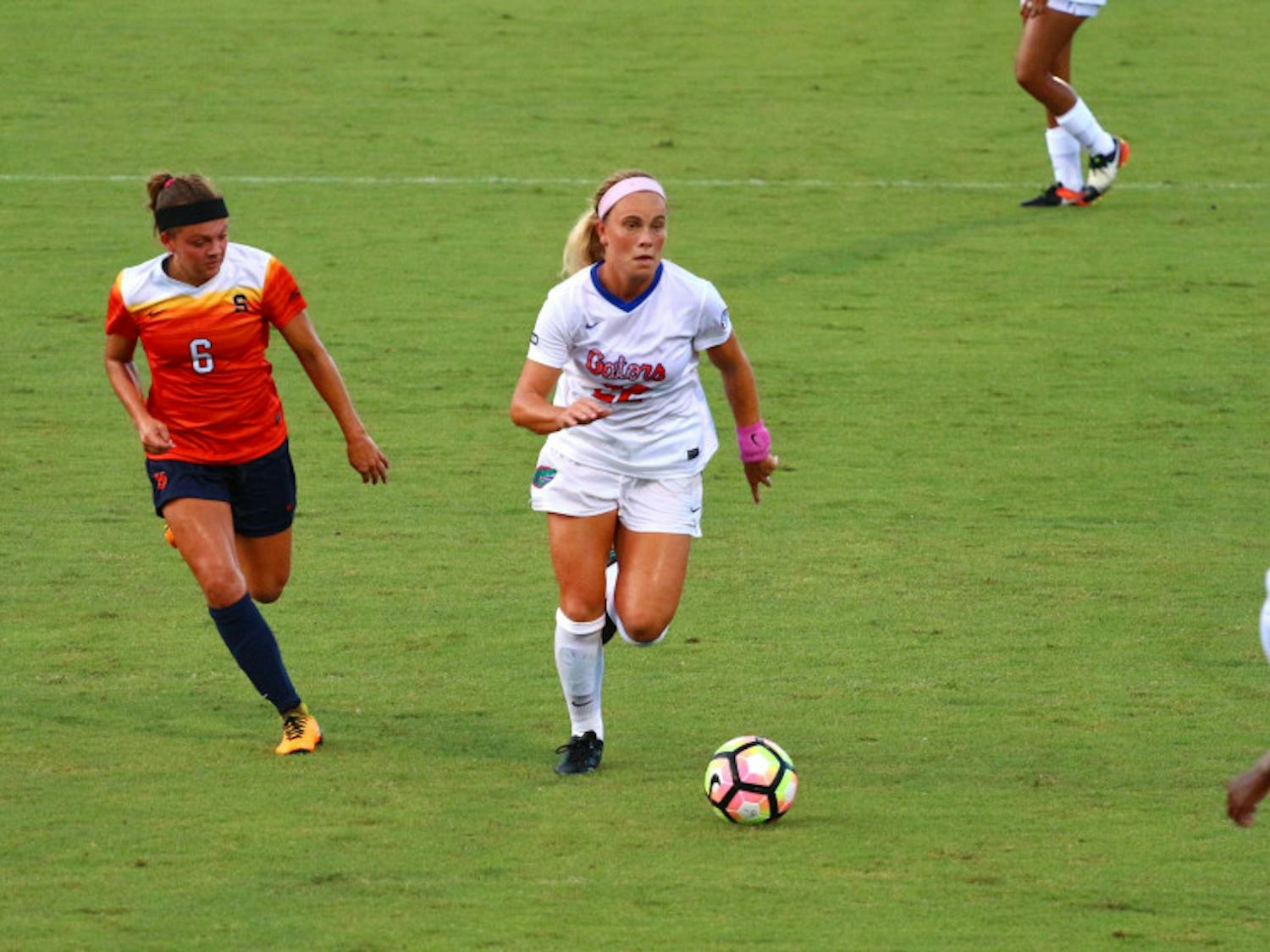 UF midfielder Parker Roberts runs with the ball during Florida's 2-1 win against Syracuse on Aug. 27, 2017, at Donald R. Dizney Stadium.