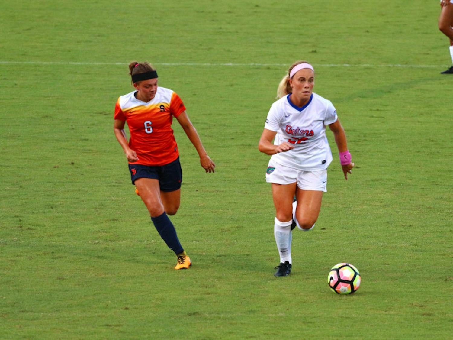 UF midfielder Parker Roberts runs with the ball during Florida's 2-1 win against Syracuse on Aug. 27, 2017, at Donald R. Dizney Stadium.
