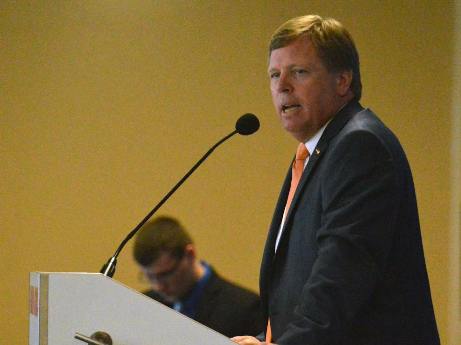 New head football coach Jim McElwain speaks at his opening press conference on Saturday in Ben Hill Griffin Stadium.