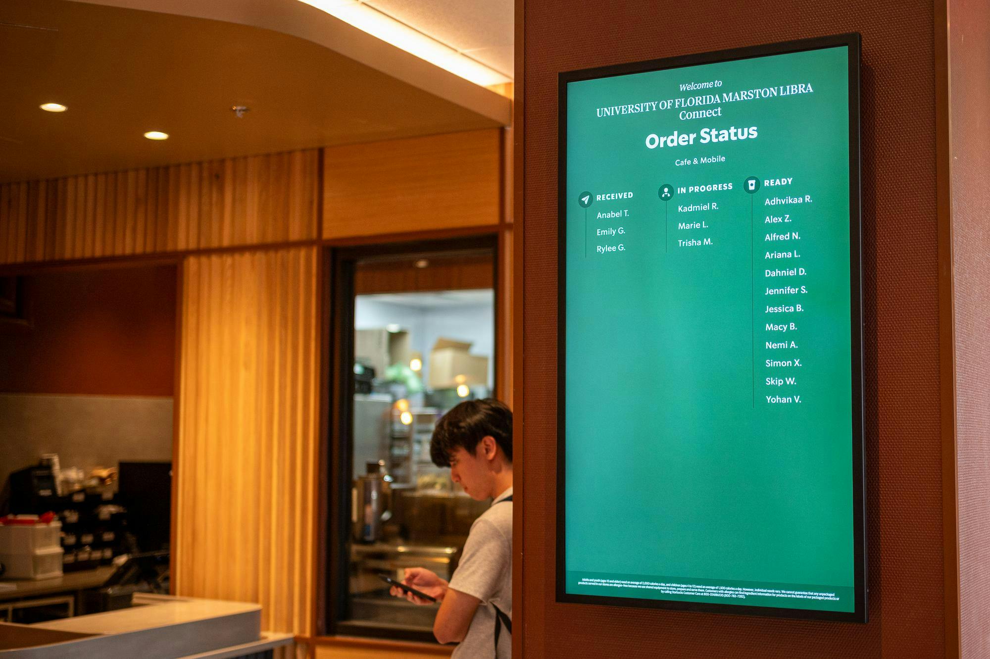 A sign inside the Marston Science Library Starbucks location showing the status of mobile orders at the store on Thursday, Sept. 11, 2025.