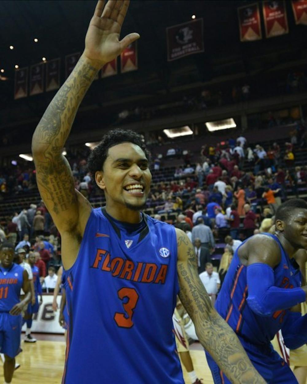 <p>Redshirt senior guard Mike Rosario reacts to Florida's 72-47 win against Florida State in Tallahassee on Wednesday, Dec. 5, 2012. Rosario scored a game-high 22 points during UF's 83-52 victory against Auburn on Saturday.&nbsp;</p>
