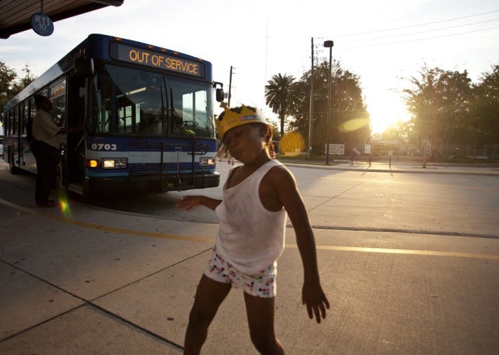 Jaiden Kelly, 4, dances at the Rosa Parks RTS Downtown Station on Wednesday afternoon. Four bus routes will be rerouted on Saturday.