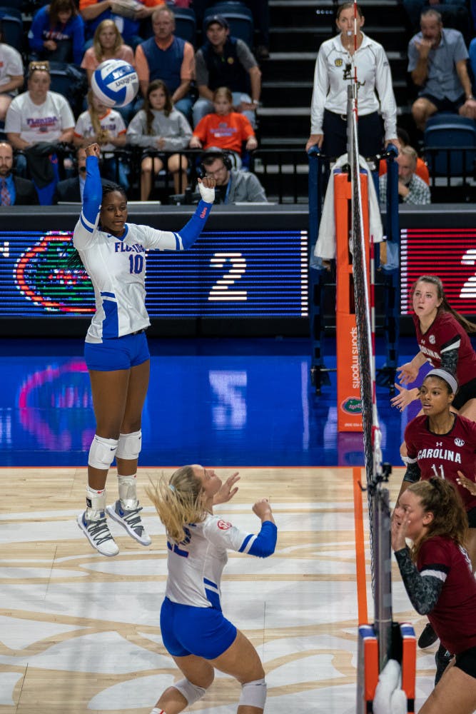 Middle blocker Taelor Kellum (10) recorded eight kills in Florida's 3-0 win over South Carolina on Friday.