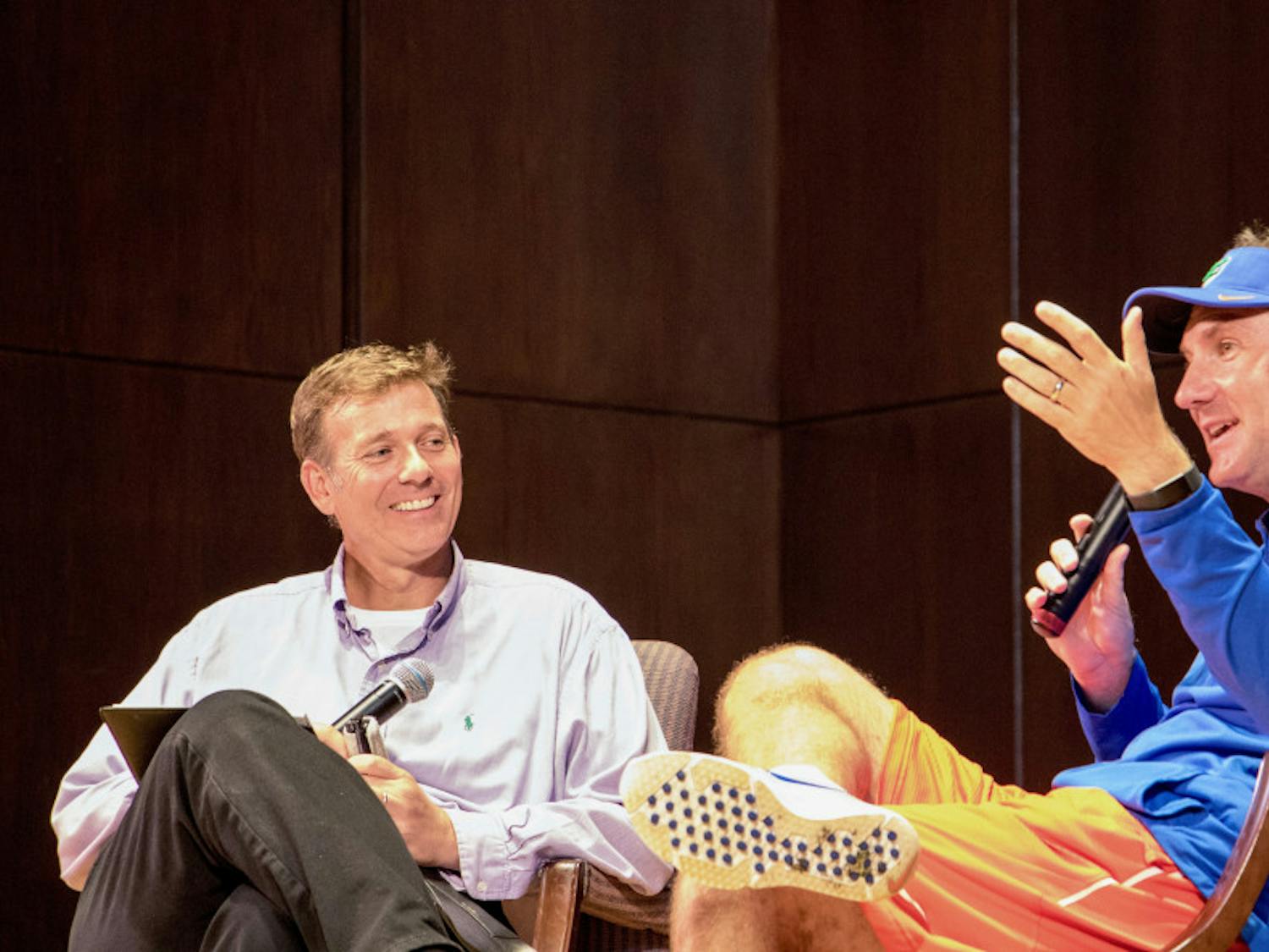 UF football head coach Dan Mullen answers questions and talks about his coaching career, the football program, and more with moderator Ted Spiker at the Accent Speakers Bureau event Tuesday night. About 200 people attended the free event at the University Auditorium.