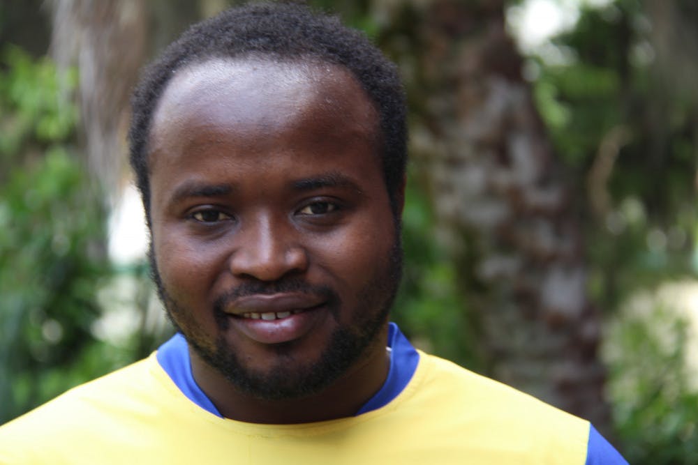 Valens Nteziyaremye, 26, poses for a photo. 