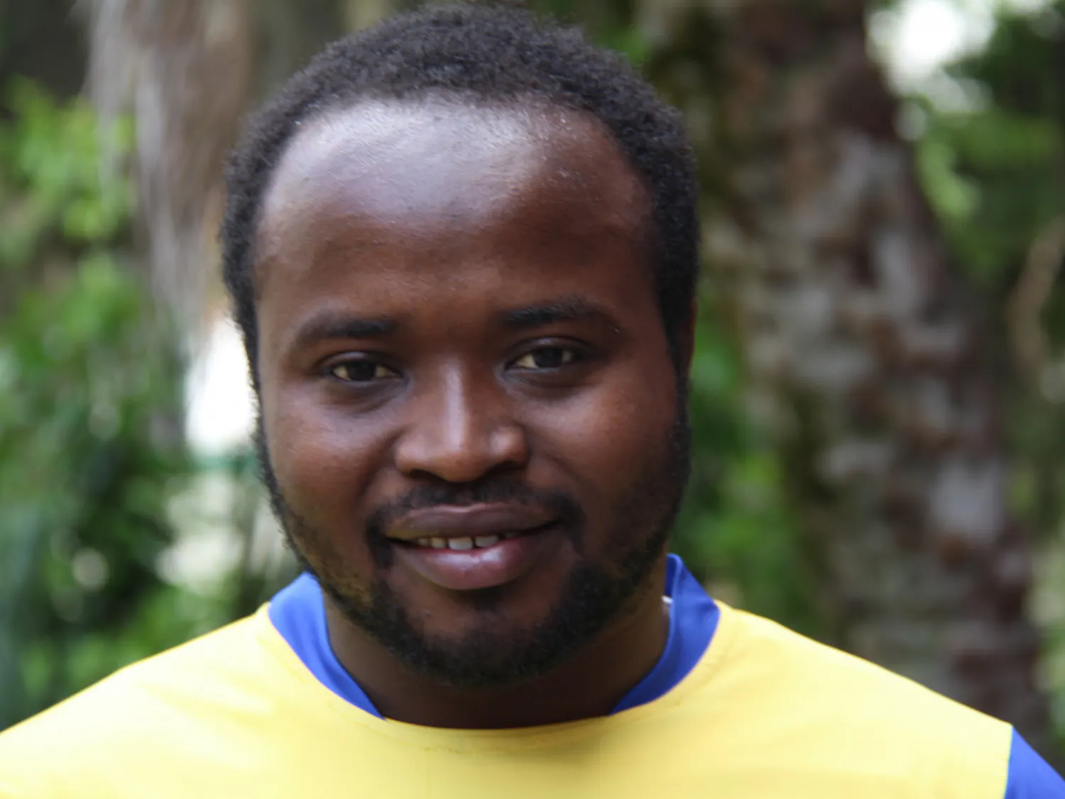 Valens Nteziyaremye, 26, poses for a photo.