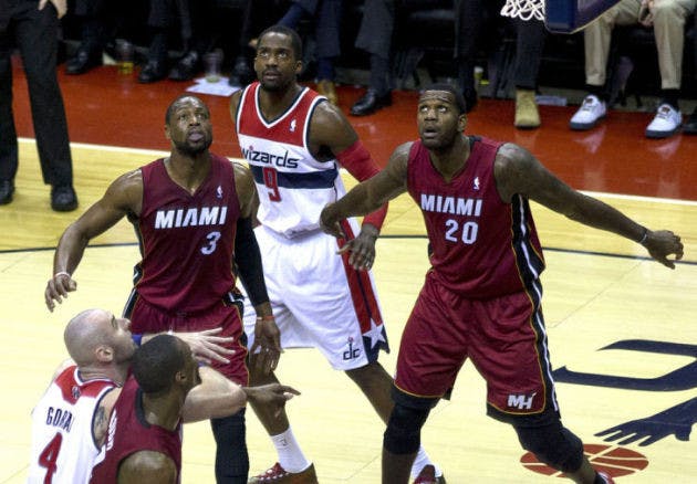 "Dwayne Wade, Greg Oden" by Keith Allison, used under CC BY-SA 2.0