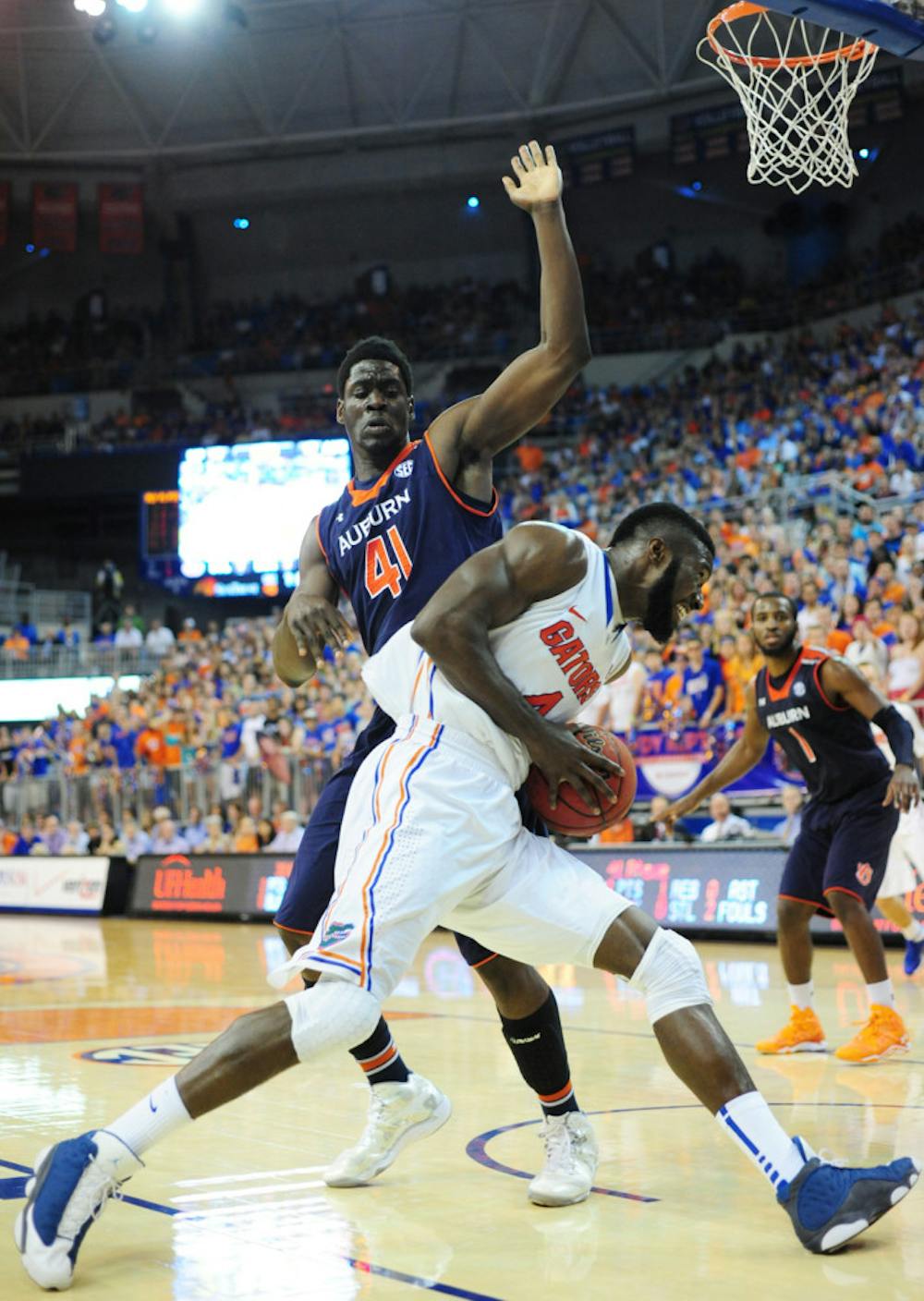 <p>Down 38-30 at the half, the Gators stormed back in the final 20 minutes behind their four seniors and the clutch three-point shooting of sophomore Michael Frazier.</p><p>Patric Young scored all 17 of his points in the second half and went 7-for-9 at the free-throw line, including hitting three within the final 20 seconds.</p><p>The Tigers had the opportunity to make their comeback down 68-66 but Allen Payne threw the inbound pass over the Gators’ bench to essentially seal UF’s 18th straight win.</p><p>With No. 1 Syracuse losing to unranked Boston College earlier that night, Florida’s victory against Auburn gave Billy Donovan’s squad the top ranking for the first time since 2007.</p>