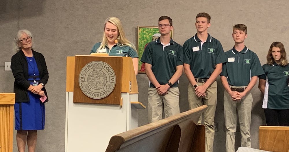<p><span>Alachua County 4-H President Madison Hurm, 17, speaks at Tuesday’s County Commission meeting. The board proclaimed Oct. 6 through Oct. 12 as National 4-H Week in Alachua County. </span></p>