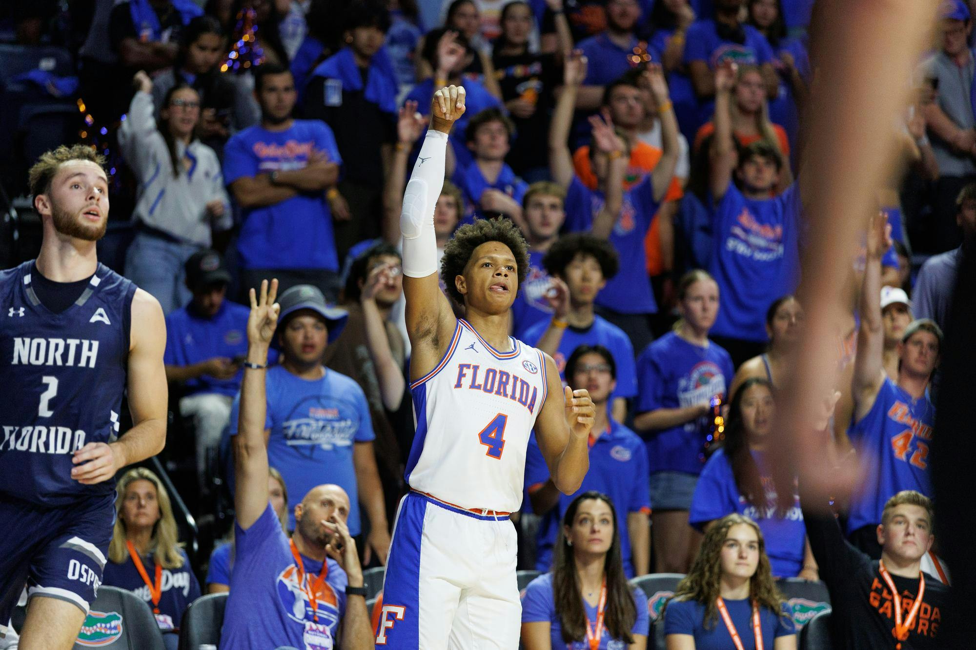 Florida Gators guard Alex Lloyd (4) watches his shot during the first half of a NCAA college basketball game against North Florida, Thursday, Nov. 06, 2025, in Gainesville, Fla.