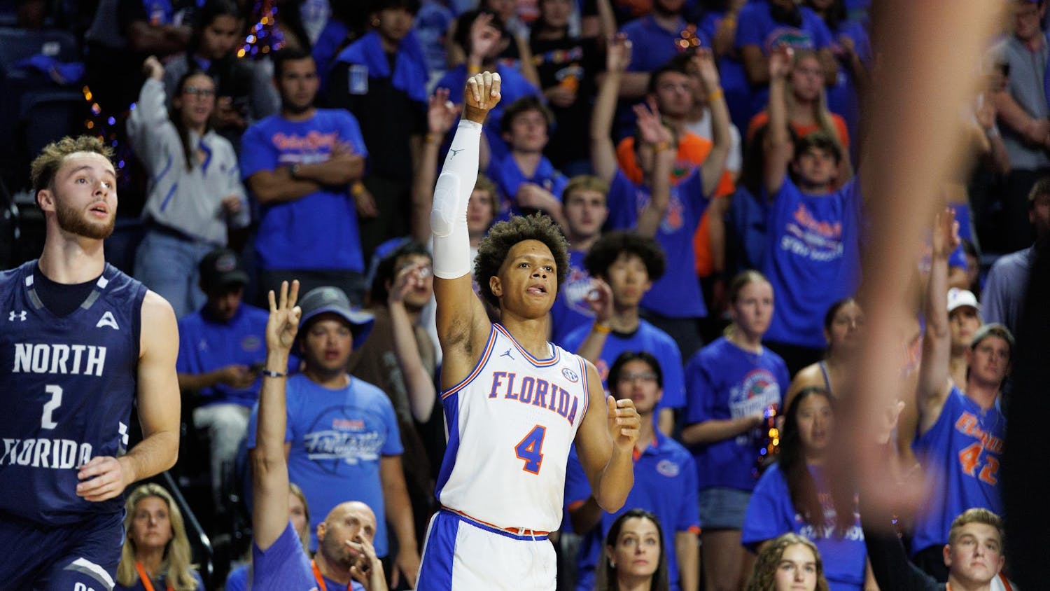 Florida Gators guard Alex Lloyd (4) watches his shot during the first half of a NCAA college basketball game against North Florida, Thursday, Nov. 06, 2025, in Gainesville, Fla.
