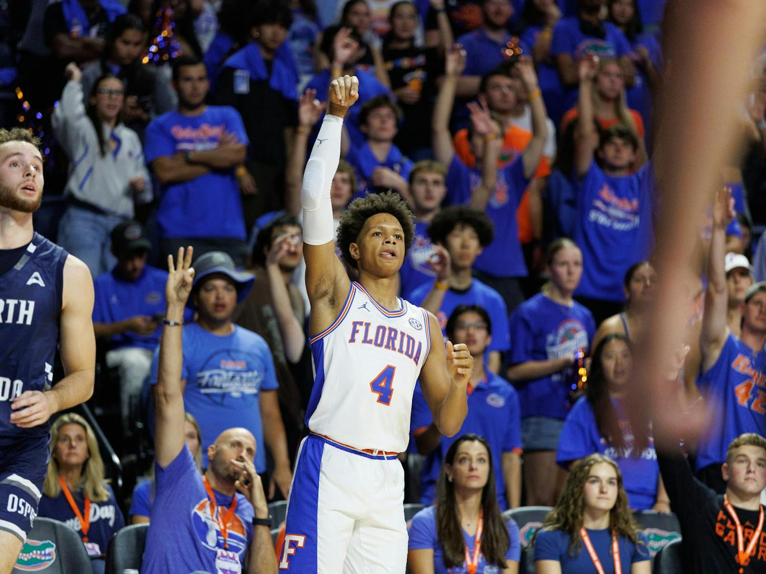 Florida Gators guard Alex Lloyd (4) watches his shot during the first half of a NCAA college basketball game against North Florida, Thursday, Nov. 06, 2025, in Gainesville, Fla.