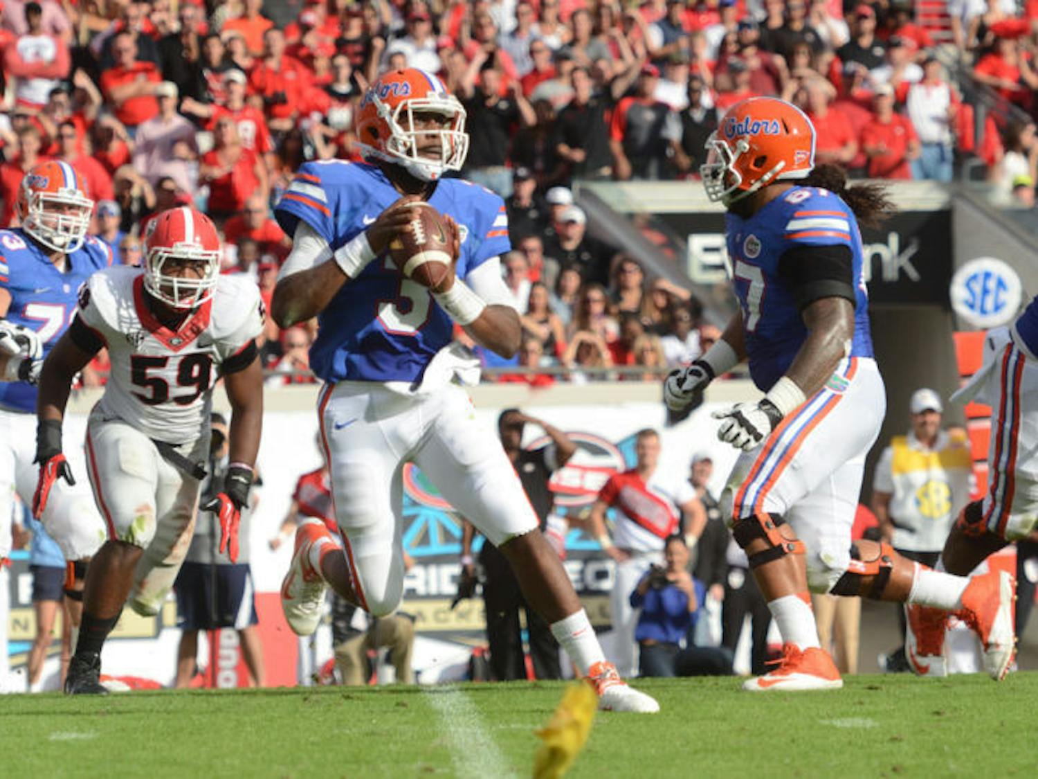 Quarterback Tyler Murphy attempts a pass during Florida’s 23-20 loss to Georgia on Nov. 2 at EverBank Field in Jacksonville. UF announced Sunday that Murphy will transfer from Florida and play his final season of eligibility elsewhere.
