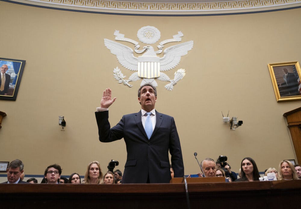 <p>Michael Cohen, President Donald Trump's former personal lawyer, is sworn in to testify before the House Oversight and Reform Committee on Capitol Hill in Washington, Wednesday, Feb. 27, 2019. (AP Photo/J. Scott Applewhite)</p>
