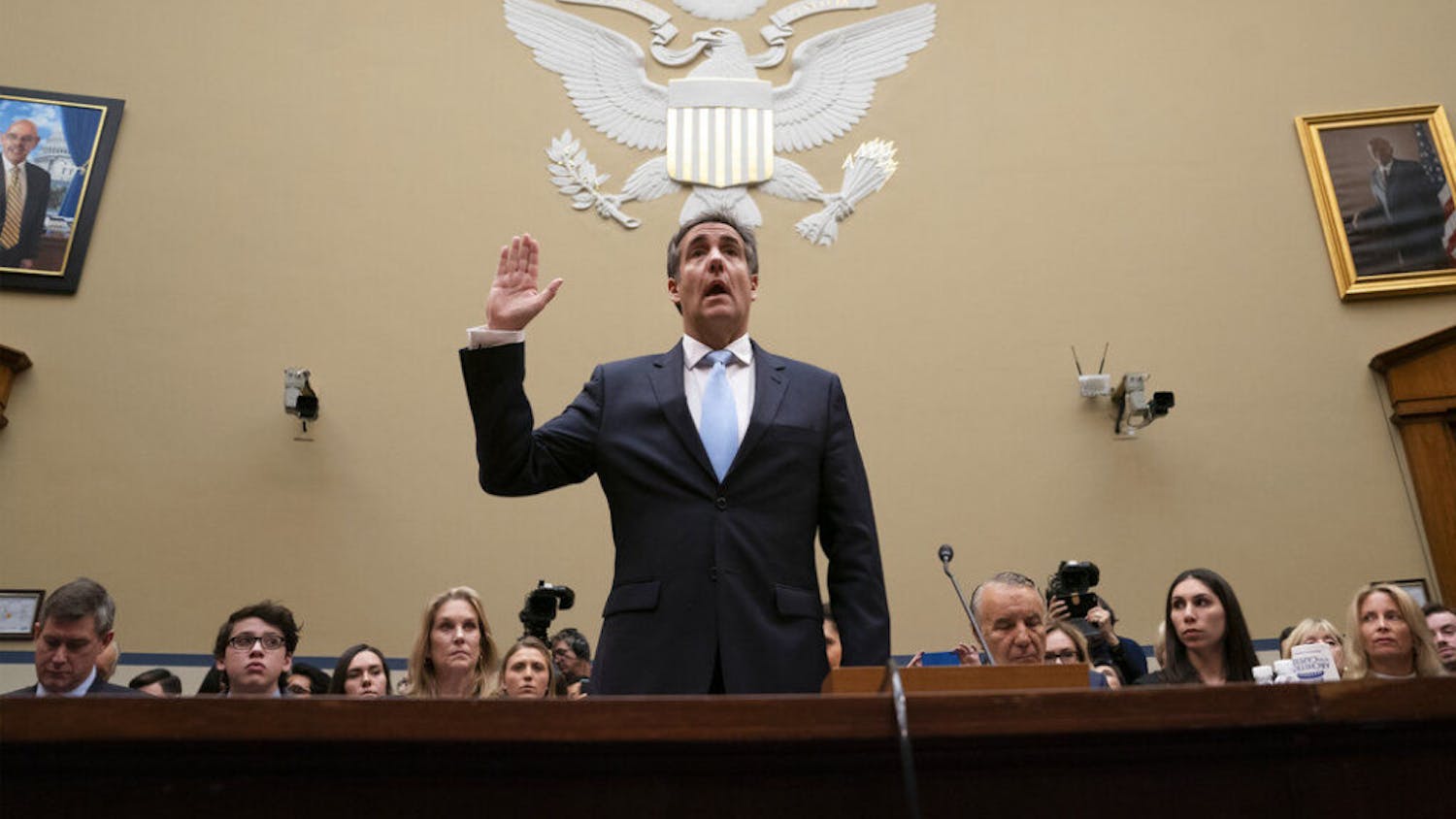 Michael Cohen, President Donald Trump's former personal lawyer, is sworn in to testify before the House Oversight and Reform Committee on Capitol Hill in Washington, Wednesday, Feb. 27, 2019. (AP Photo/J. Scott Applewhite)