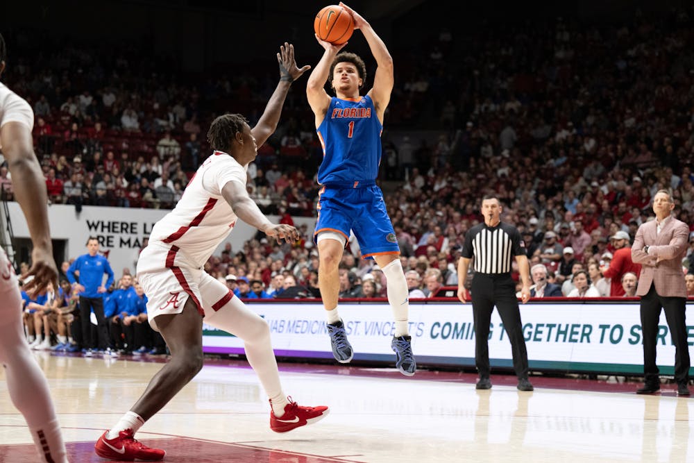 Florida Gators guard Walter Clayton Jr. (1) shoots the ball in a basketball game against Alabama on Wednesday, March 5, 2025, in Tuscaloosa, Ala.