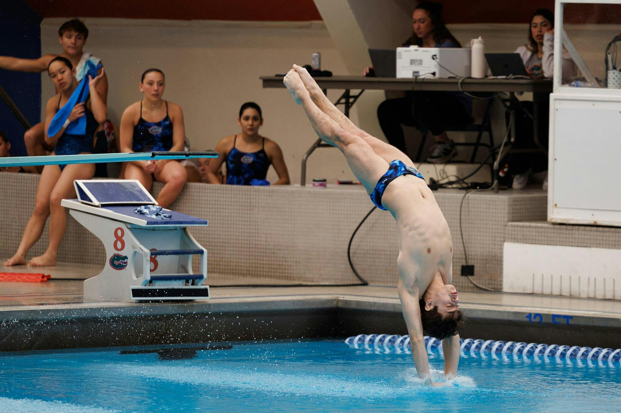 Conor Gesing dives during a meet between the Florida Gators and Florida State Seminoles at the Stephen C. O'Connell Center Natatorium on Friday, Jan. 30, 2026.