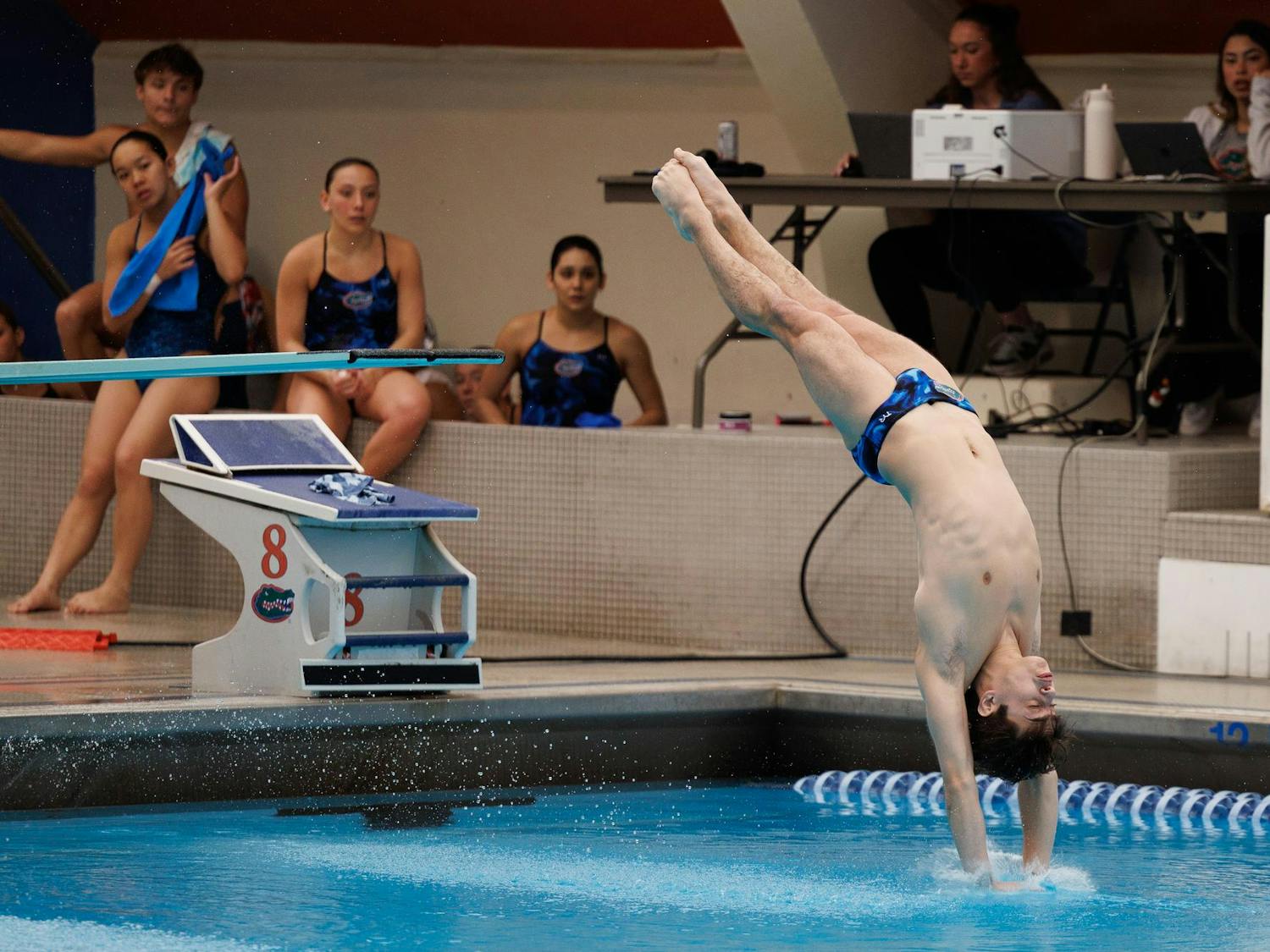 Conor Gesing dives during a meet between the Florida Gators and Florida State Seminoles at the Stephen C. O'Connell Center Natatorium on Friday, Jan. 30, 2026.