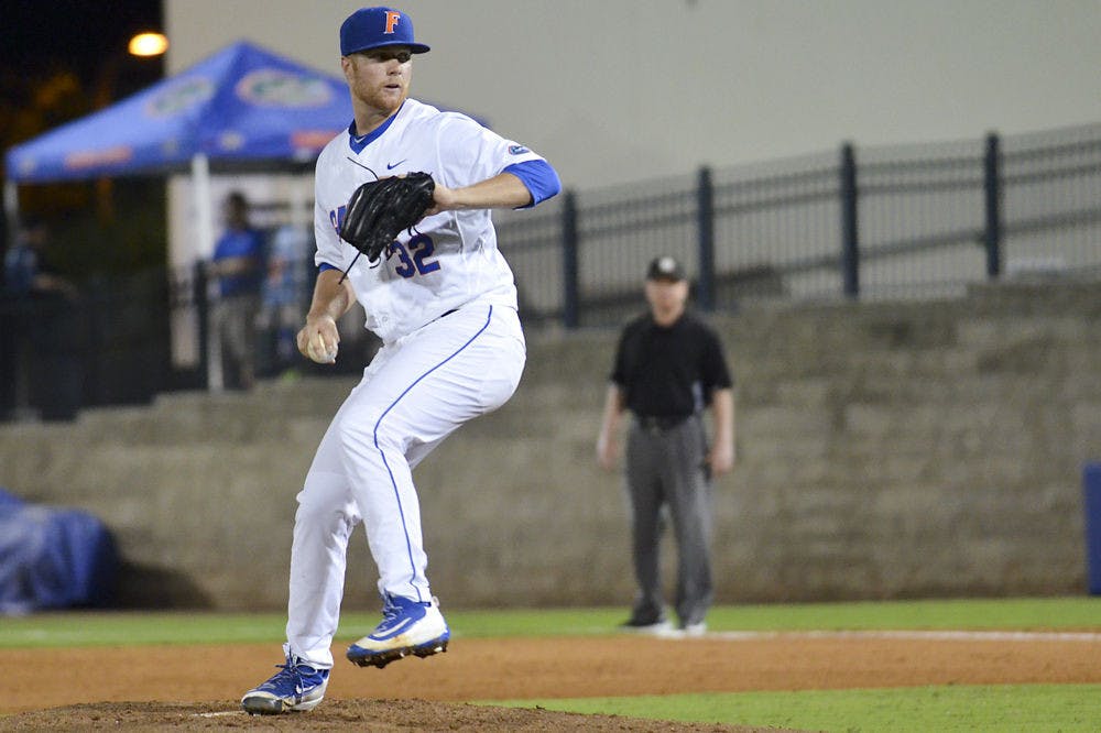 Logan Shore pitches during Florida's 4-3 win over Missouri on March 18, 2016, at McKethan Stadium.&nbsp;