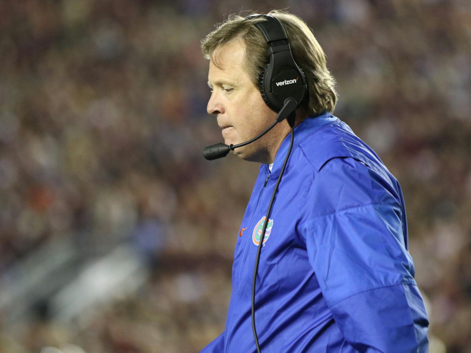 Florida football coach Jim McElwain paces the sideline during UF's 31-13 loss against Florida State on Nov. 26, 2016, in Tallahassee.