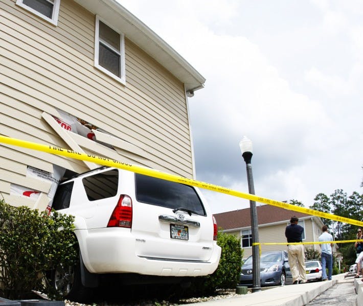 Mercedes Machado, a first-year mental health counseling graduate student, drove her car halfway into her neighbor’s condominium, Kensington South Condos apartment No. 801.