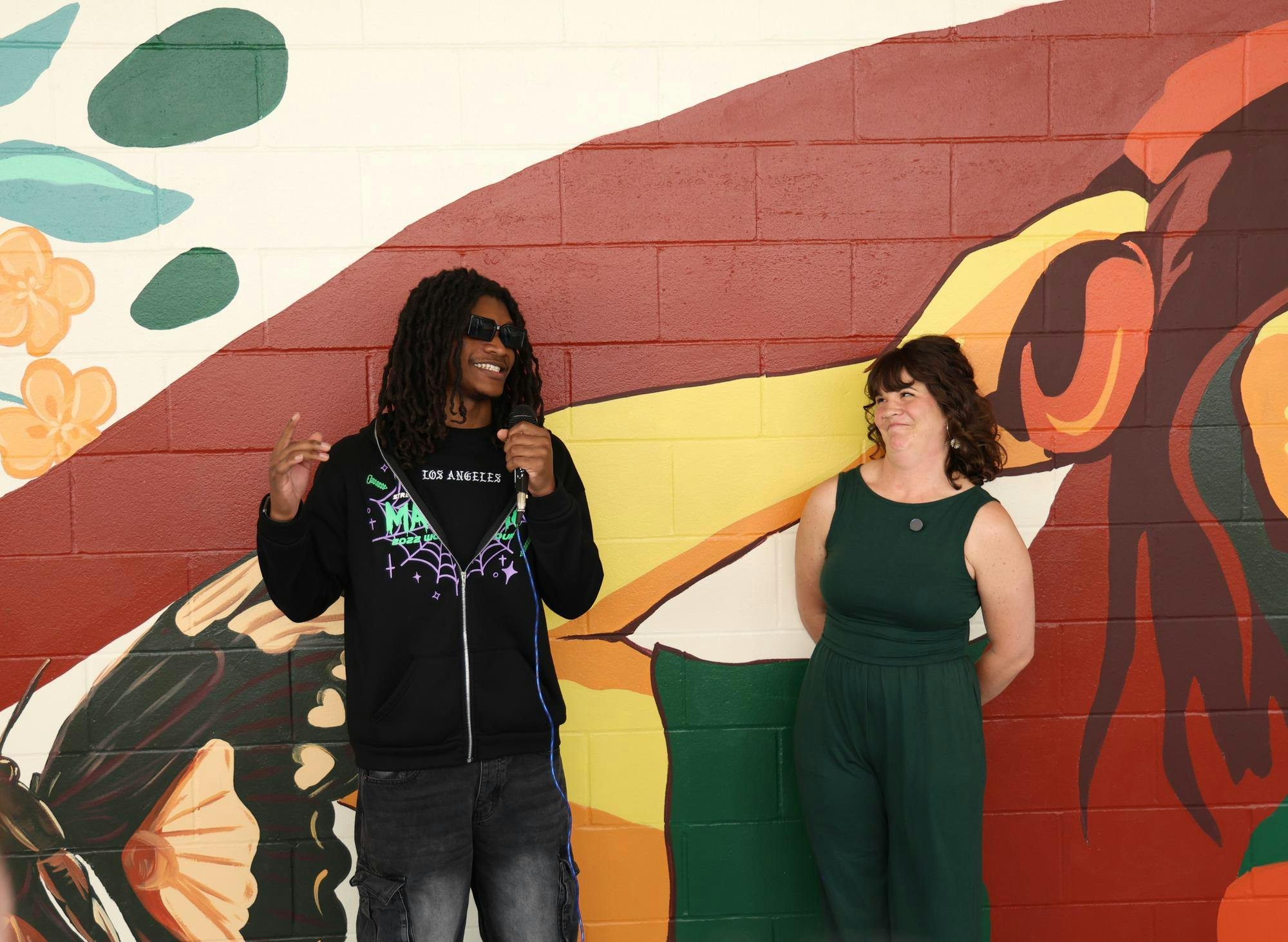 Kaleb Gordon shares his experience helping Jenna Horner with this mural at Eastside High School, Tuesday, March 31, 2026, in Gainesville, Fla.
