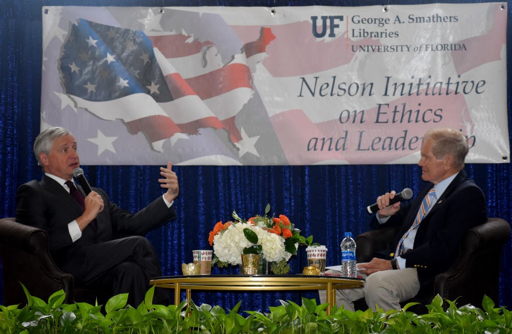 Former U.S. Senator Bill Nelson and author Jon Meacham discuss political division in the United States throughout history on Thursday morning.