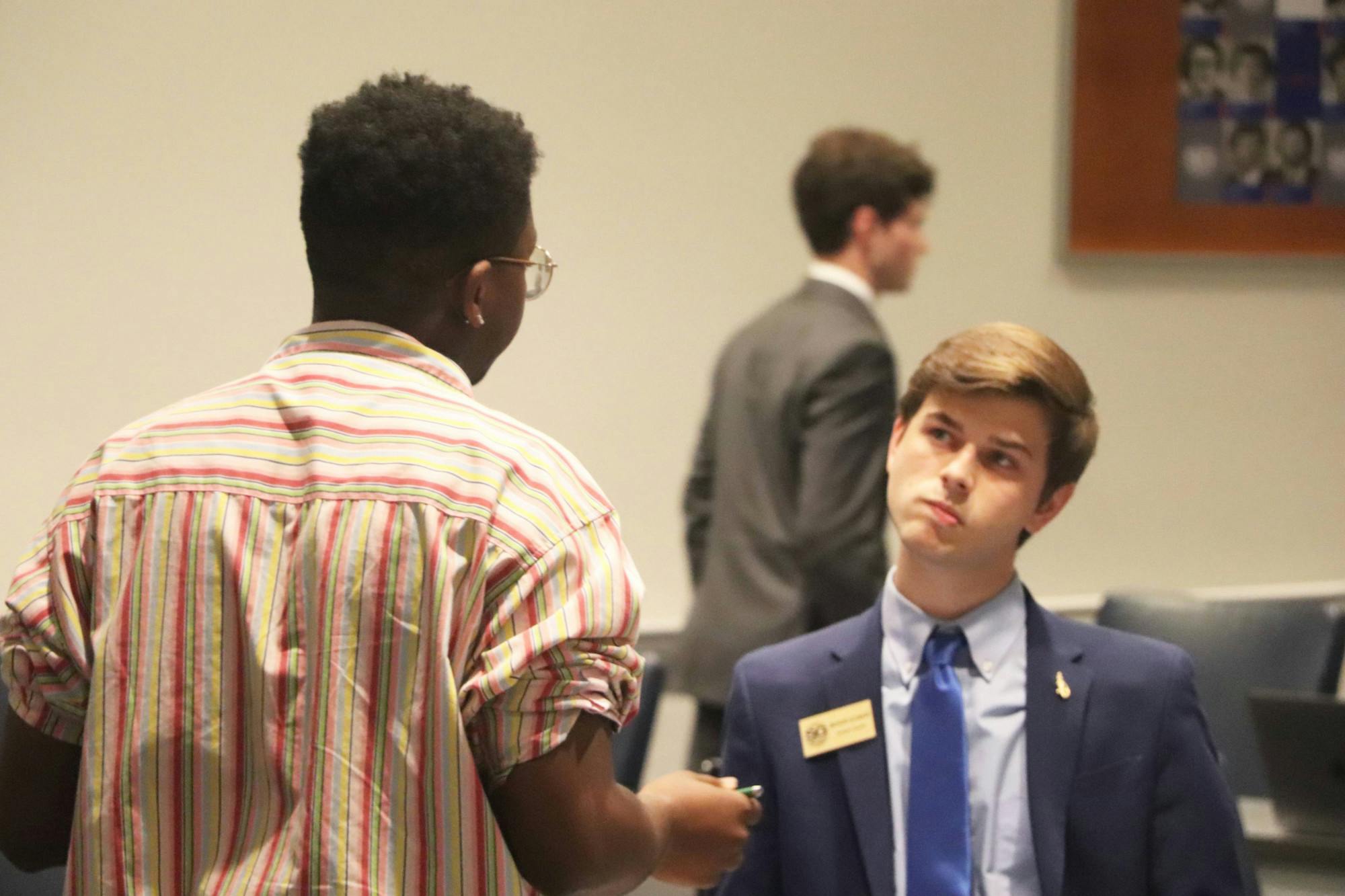 Judiciary Committee Chairperson Jonathan C. Stephens (Change-District D) and Minority Party Leader Bronson Allemand (Gator - District A) have a discussion after a three minute recess was requested on the Tuesday, June 13 Senate meeting. ﻿