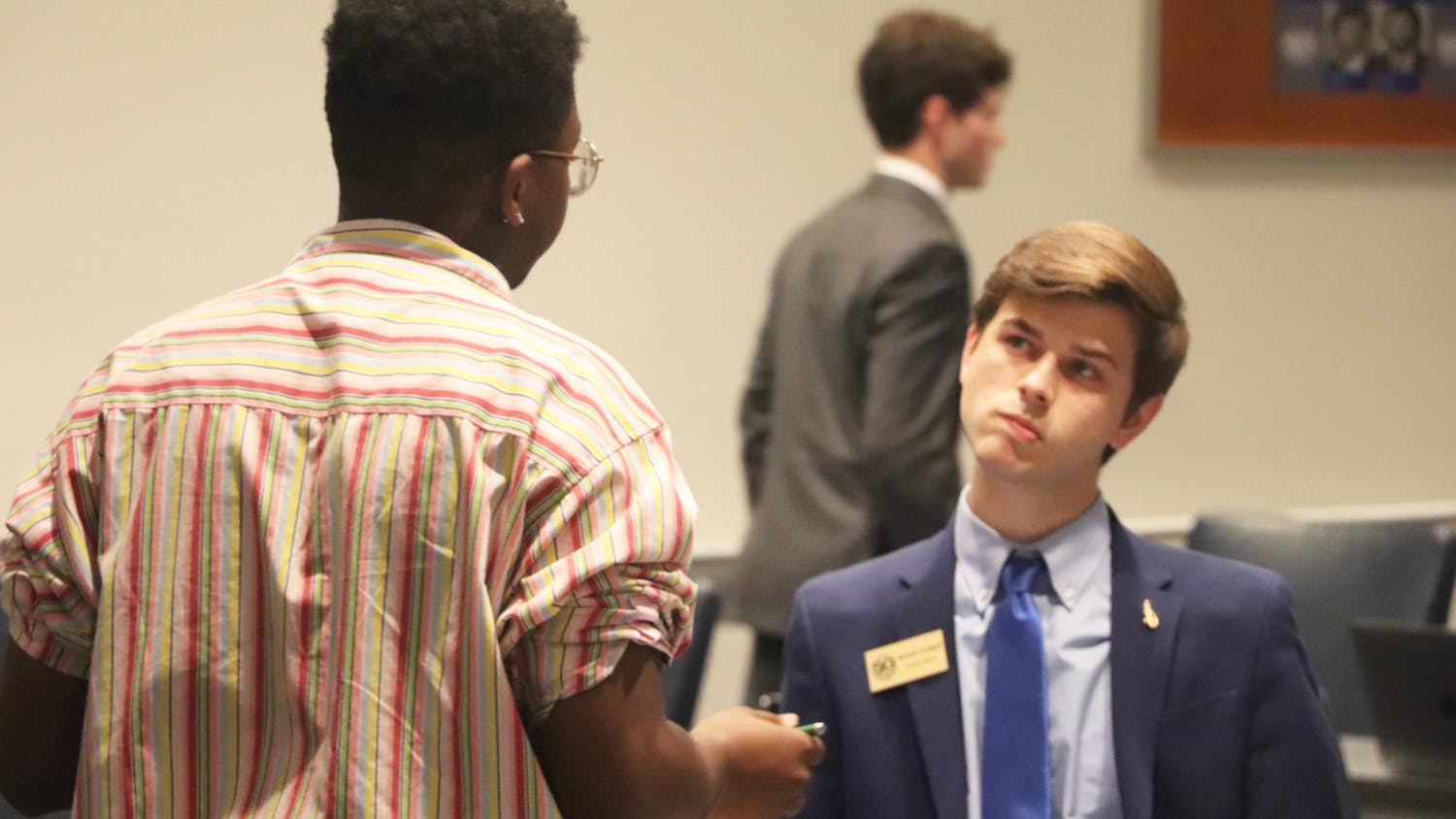 Judiciary Committee Chairperson Jonathan C. Stephens (Change-District D) and Minority Party Leader Bronson Allemand (Gator - District A) have a discussion after a three minute recess was requested on the Tuesday, June 13 Senate meeting. 