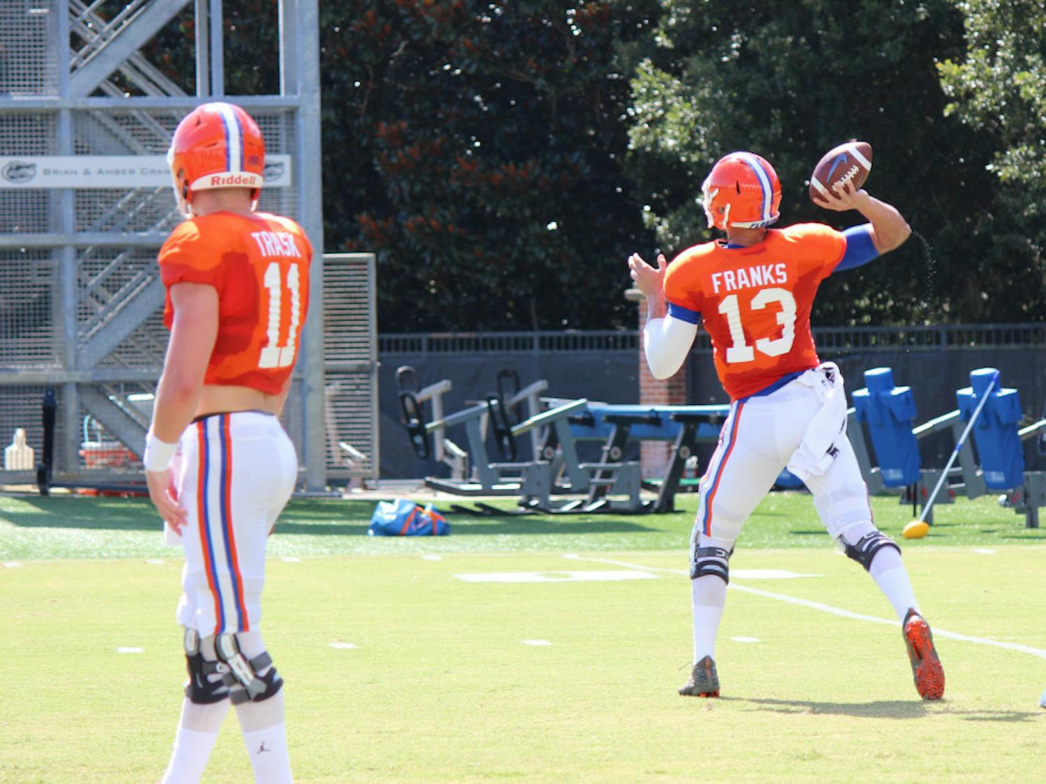 Redshirt sophomore Feleipe Franks (right) is competing with redshirt sophomore Kyle Trask (left) for the starting quarterback position. Franks played in all 11 games for UF last season and started eight. 