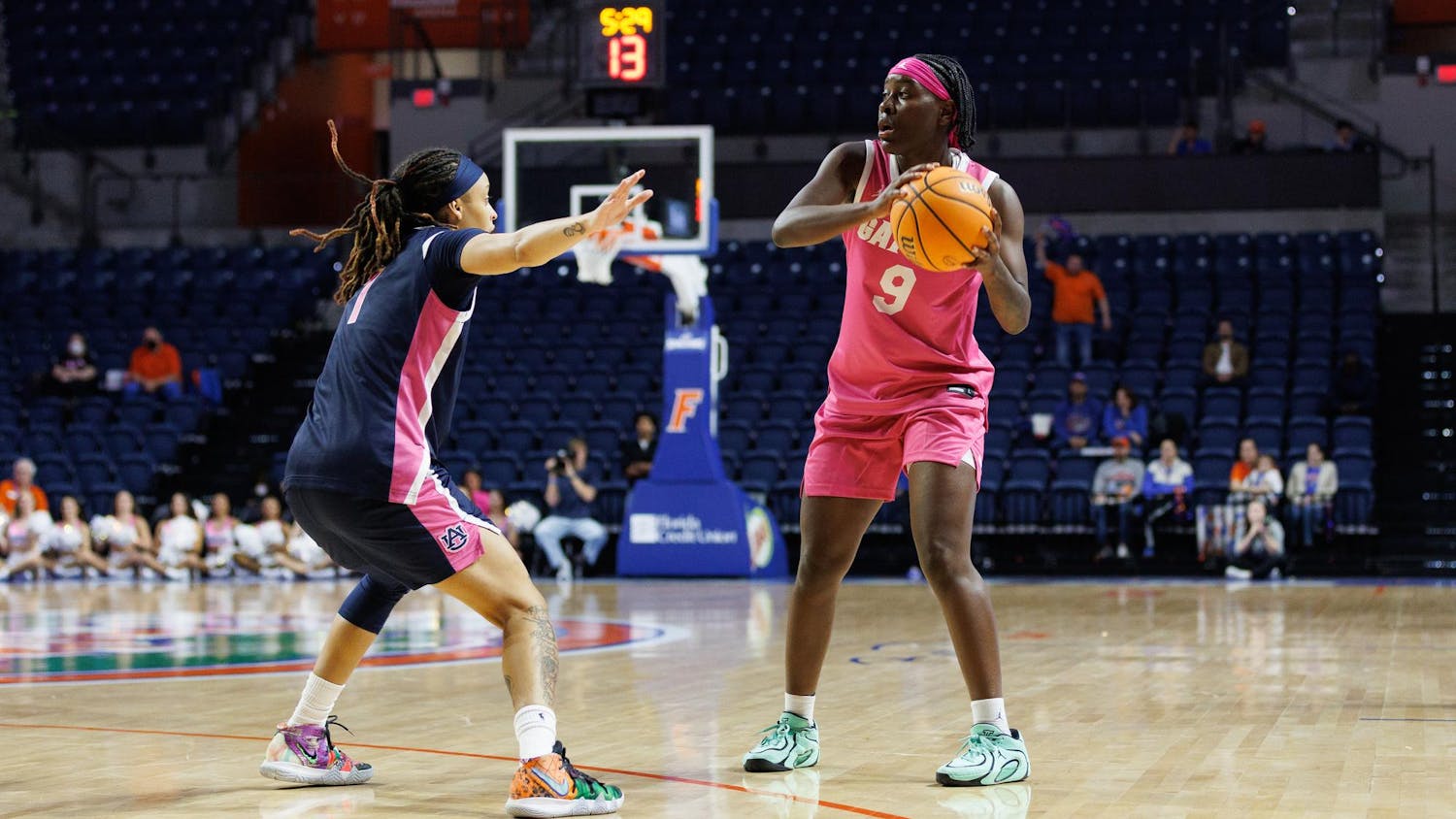 Florida guard Alexia Dizeko (9) holds the ball during the second half of an NCAA basketball game against Auburn, Thursday, Feb. 5, in Gainesville, Fla.