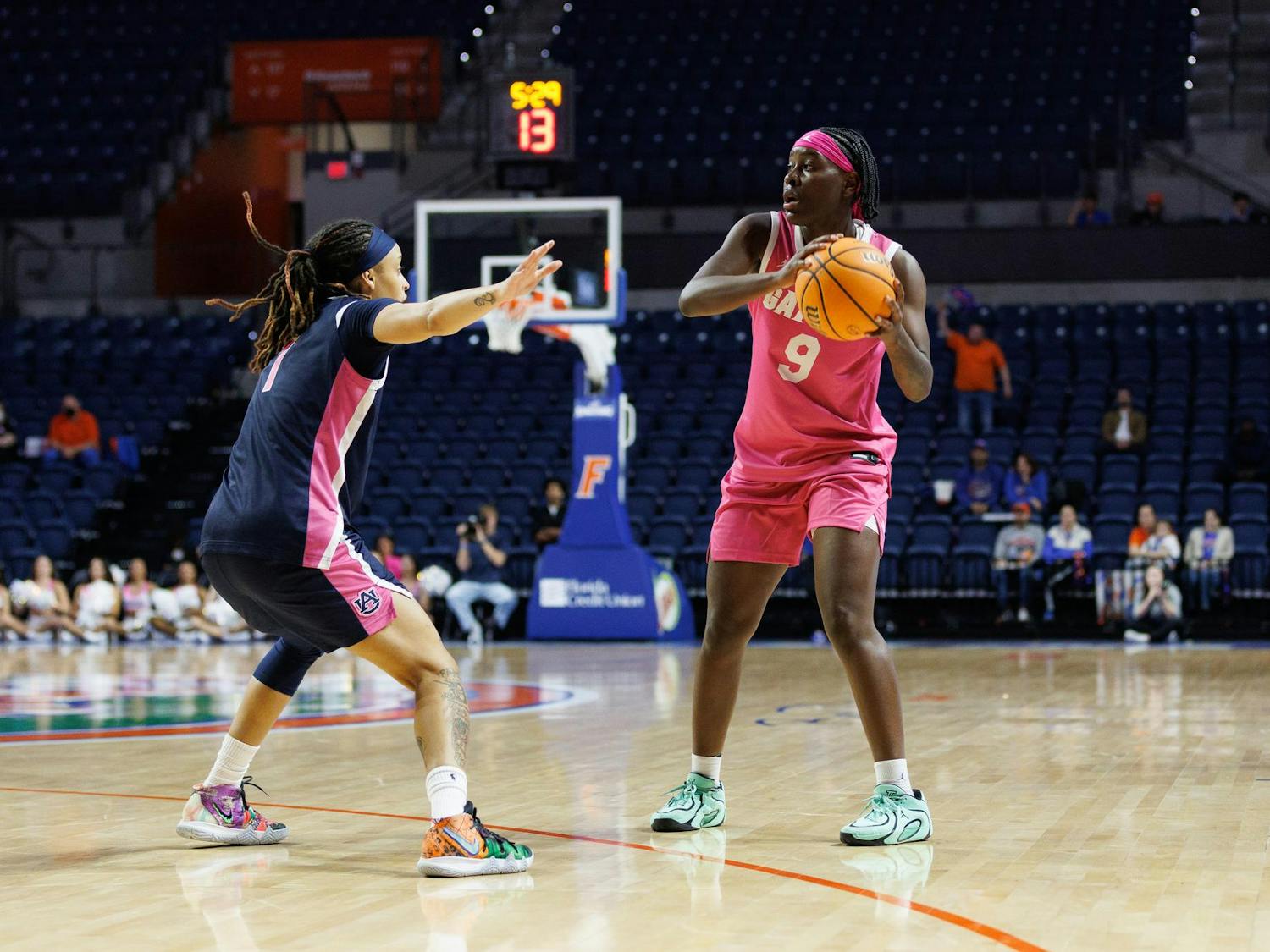 Florida guard Alexia Dizeko (9) holds the ball during the second half of an NCAA basketball game against Auburn, Thursday, Feb. 5, in Gainesville, Fla.