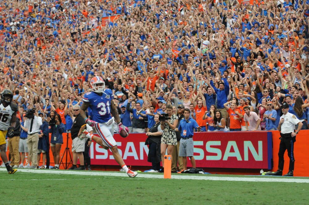 Jalen Tabor returns an interception for a touchdown during Florida's 40-14 win over Missouri on Oct. 15, 2016, at Ben Hill Griffin Stadium.