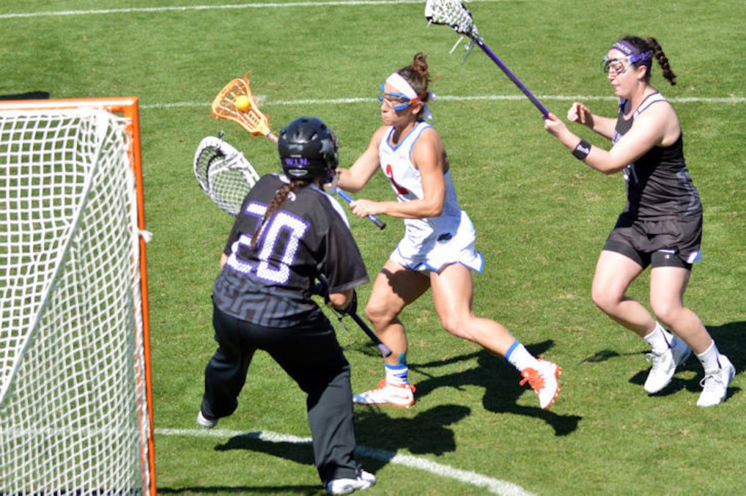 Sammi Burgess attempts a shot during Florida's 18-7 win against High Point on Feb. 15 at Donald R. Dizney Stadium. Burgess, the ALC Rookie of the Week, scored a career-high four goals against Vanderbilt on Sunday.